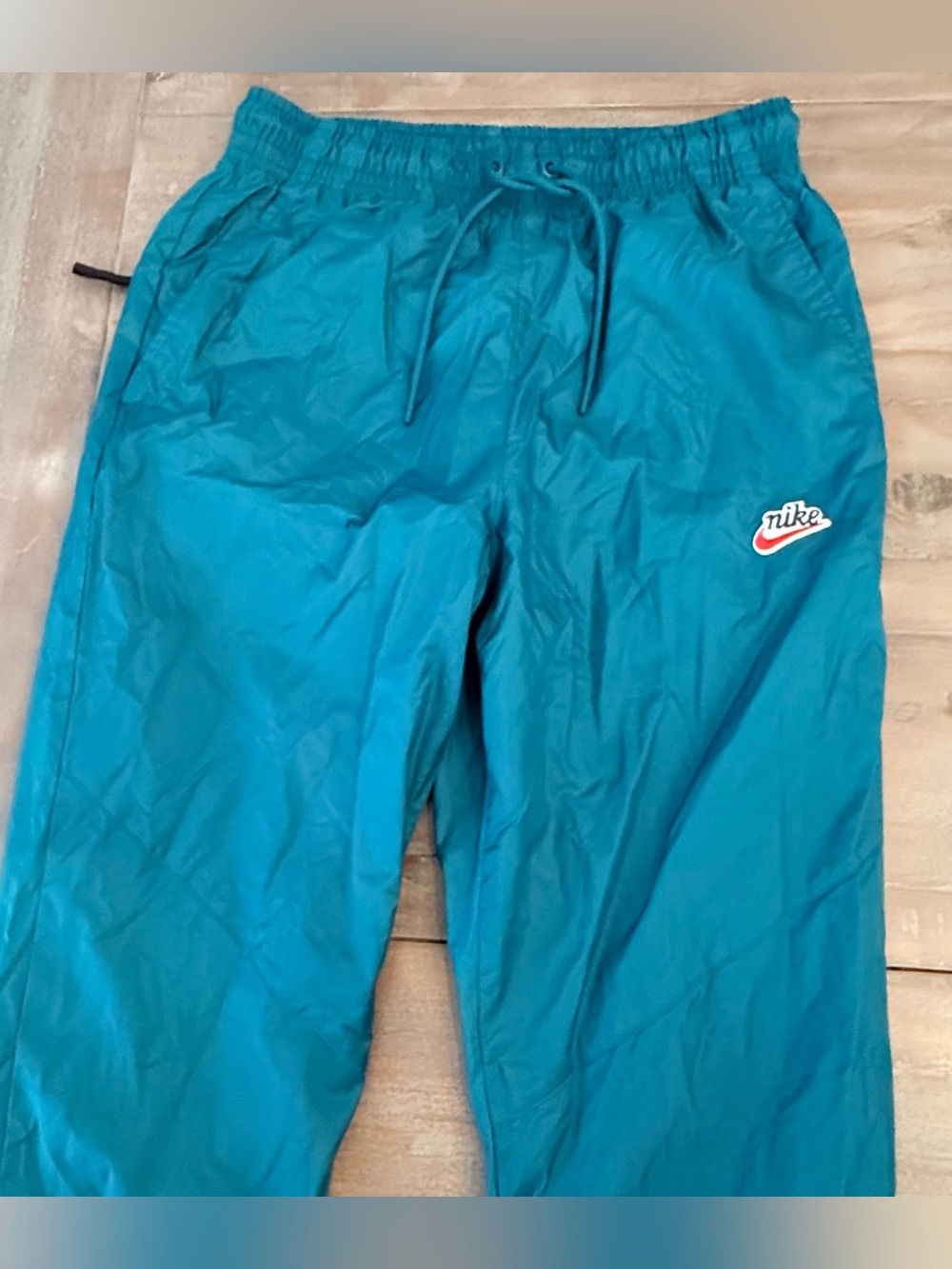 Nike Women’s nylon track pants M Fully Lines turquoise blue Preowned
